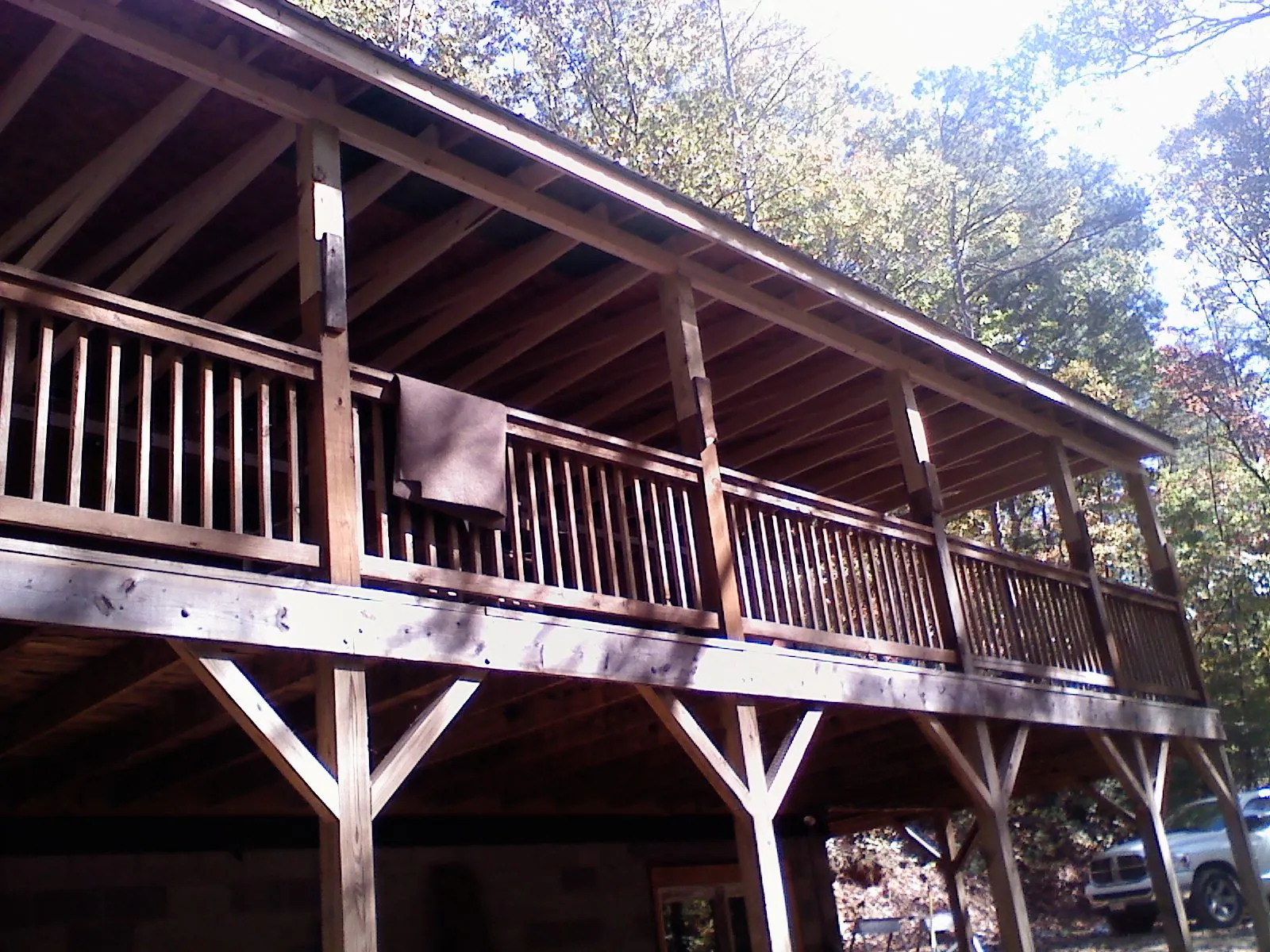 Timber framing under a new elevated porch and deck — Roof Leak Repair in Greenwich by Roofing Brothers